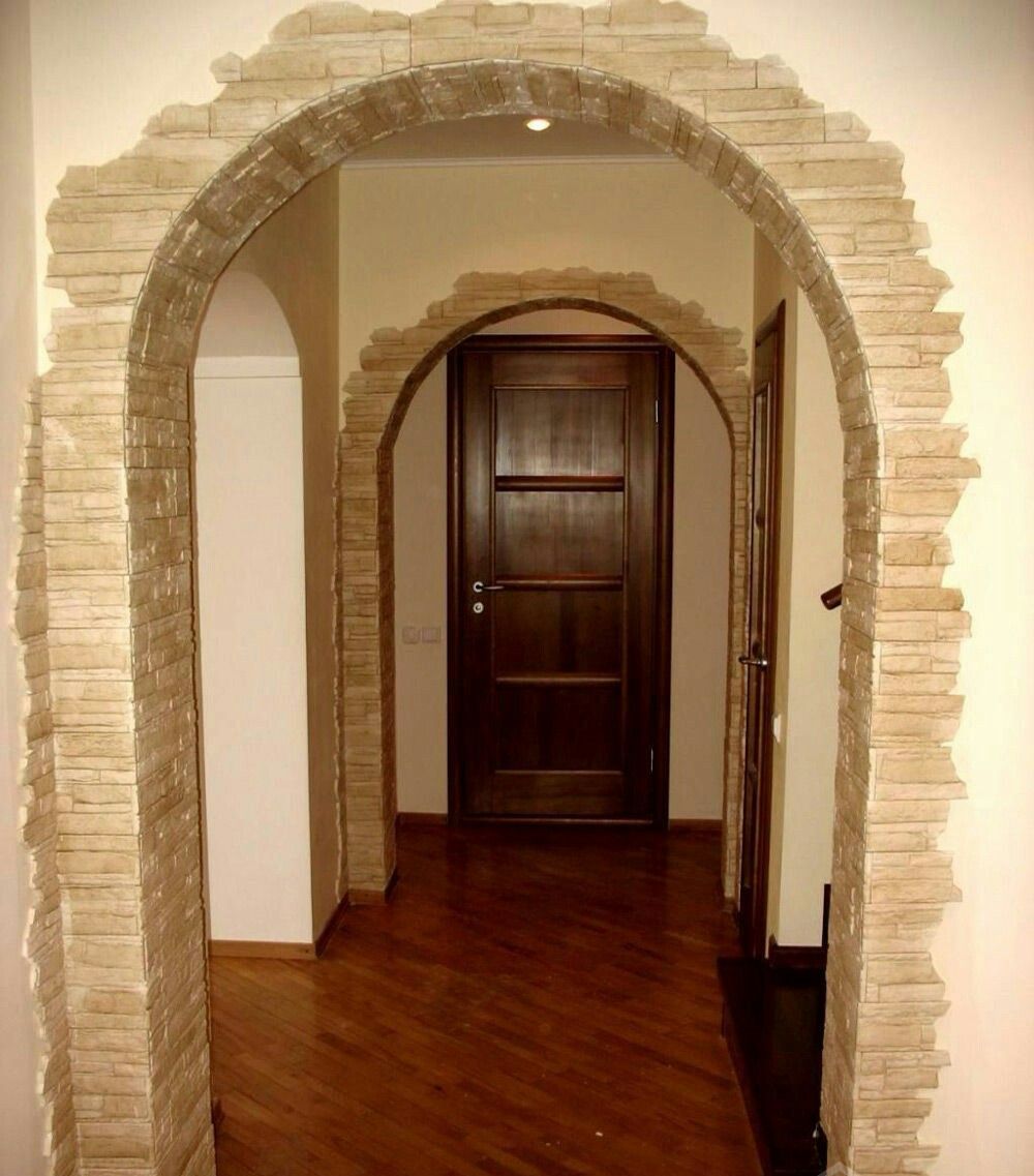 отделка арки декоративным камнем в доме фото