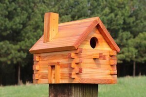 Free log cabin style bird house plans with patterns.
